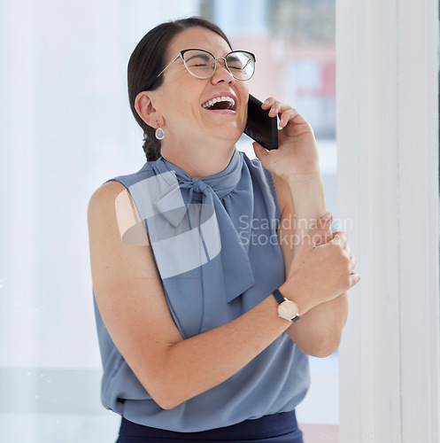 Image of Phone call, laughing and funny with a business woman in her office, talking on her mobile to share good news. Contact, conversation and humor with a young female employee joking while working