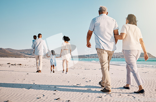Image of Holding hands, beach family and people walk, bond or enjoy time together for travel vacation, holiday peace or freedom. Sea water, ocean love and back view of senior couple in Rio de Janeiro Brazil