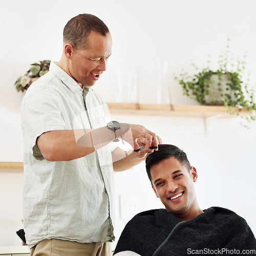 Image of Father, man and shaving hair in home for grooming, cleaning and trimming. Smile, laughing and happy male or son getting haircut with electric shaver from senior dad for hairstyle and bonding in house