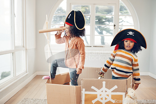 Image of Pirate, box and games with children in living room for playful, creative and imagine. Fantasy, relax and party with kids sailing in cardboard boat at home for free time, weekend and entertainment