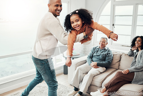 Image of Dad, daughter and airplane game in living room for portrait, happy family or comic playing for bonding. Father, child and swing for plane games in lounge with woman, men or love for holiday happiness