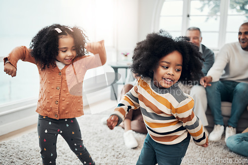 Image of Children dancing, living room and happy family with parents, grandparents or love for comic smile in home. Kids, men and women for dance, care and happiness for brother, sister or together on holiday