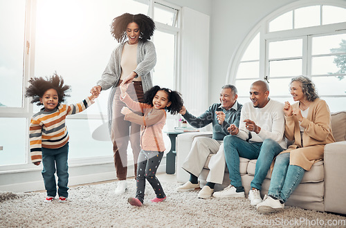 Image of Black family, vacation and mother playing with children in a home in winter and bonding together in a house. Parents, grandparents and mom play with kid having fun in a living room on a getaway