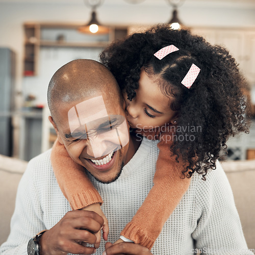 Image of Family, hug and girl kissing father on sofa, happy and laugh, playing and bonding in their home. Piggyback, embrace and child with parent on couch, sweet and hugging while having fun in living room