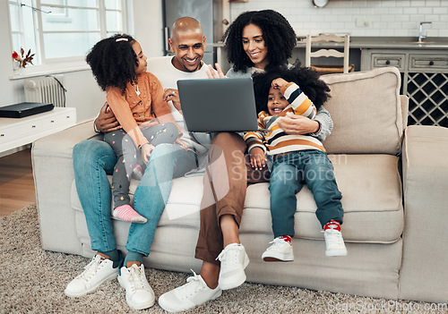 Image of Happy family, laptop and kids on sofa for video, comedy movie and streaming on internet for quality time. Man, woman and children with computer for film, movies or games on lounge couch for holiday