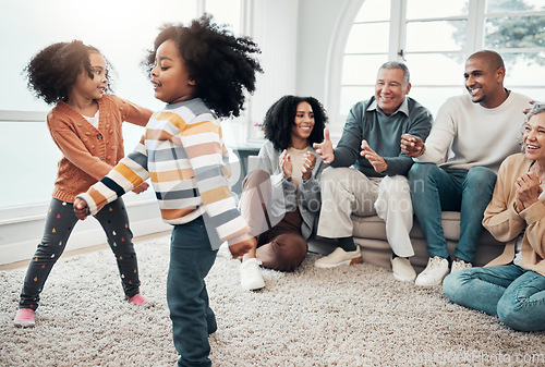 Image of Happy family, children dancing and living room with parents, grandparents or love with applause in home. Girl kids, mom and dad with dance, smile or happiness for bonding in house together on holiday