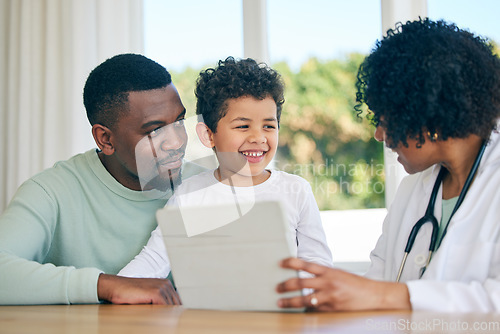 Image of Pediatrician tablet, dad and child with a smile from patient results with good news at a hospital. Happy kid, father and doctor in a clinic consultation office with a healthcare worker and family