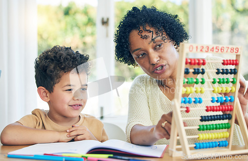 Image of Abacus, grandmother or boy learning math kindergarten homework or school education in house. Numbers counting or serious senior woman teaching or helping a smart young boy student with development