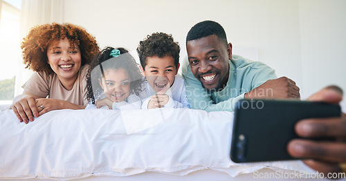 Image of Love, bedroom and selfie of happy black family bonding, relax or enjoy quality time together on Jamaica holiday. Youth children, parents and morning memory photo of kids, mother and father on bed