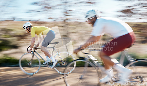 Image of Race, cycling and fast with men in park for training, motion blur and cardio workout. Marathon, sports and exercise with cyclists riding on bike for speed, challenge and fitness for competition