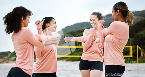 Image of Volleyball, team and women stretching on beach excited to play match, competition and sport game. Teamwork, fitness and happy female players stretch arms for warm up practice, training and exercise