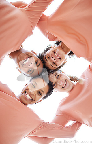 Image of Happy, diversity and portrait of females in circle from bottom with partnership, unity and community. Happiness, smile and women friends laughing, bonding and standing together by a white background.