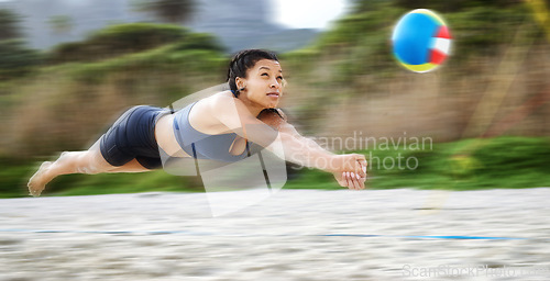 Image of Beach volleyball, diving or sports girl playing a game in training or fitness workout in summer. Air jump, blurry dive action or active woman on sand in a fun competitive match in Sao Paulo, Brazil