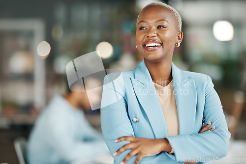 Image of Happy, smile and arms crossed with black woman in office for leadership, management and development. Vision, inspiration and mission with female employee for growth, motivation and empowerment