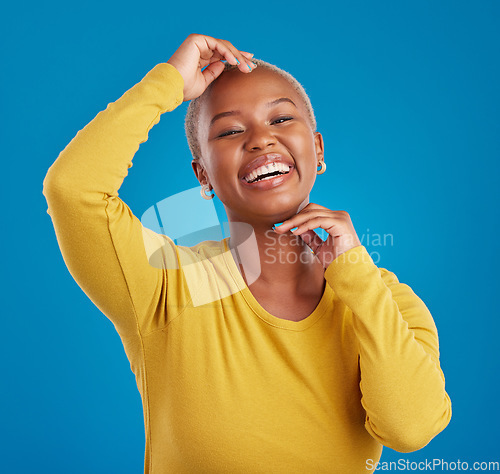 Image of Happy, portrait and black woman in studio smile, cheerful and laughing on mockup, space or blue background. Face, joy and female laugh, joke and silly humor, carefree and having fun while isolated