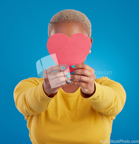 Image of Paper, heart and cover with black woman in studio for love, date and kindness. Invitation, romance and feelings with female and shape isolated on blue background for emotion, support and affectionate