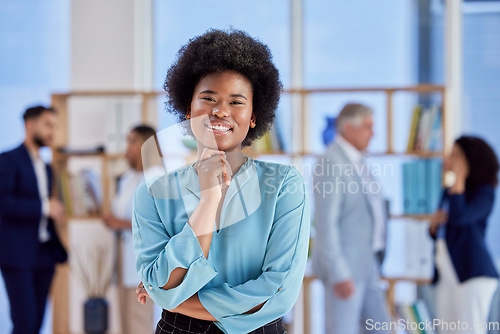 Image of Portrait, mission and mindset with a business black woman in her office, standing on chin for future thinking. Face, vision and idea with a female employee looking confident in company success