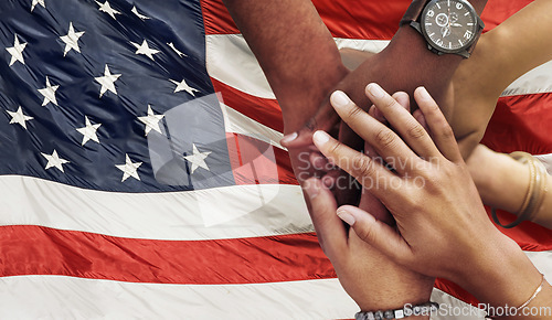 Image of Teamwork, support and hands stacked on American flag for community together in collaboration for the country. Group, unity and closeup of international team meeting in trust, activism and victory
