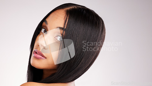 Image of Beauty, hairstyle and portrait of woman in studio for keratin treatment, shampoo and self care. Salon, texture and natural with model on white background for straight hair, satisfaction and results