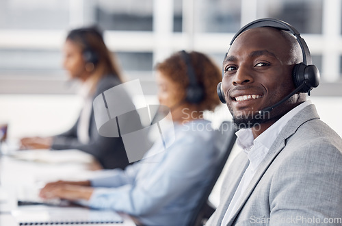 Image of Portrait, telemarketing and black man with team, call center and customer service in workplace. Face, African American male employee or happy consultant in office, headset and tech support in office