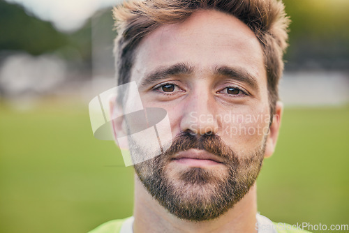 Image of Rugby, field and portrait of man with serious expression, confidence and pride in winning game. Fitness, sports and zoom on face of player ready for match, workout or competition on grass at stadium.