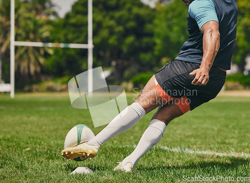 Image of Rugby, sports man or kickball in game, practice workout or training match on stadium field outdoors. Fitness body, score goals or athlete player action playing in cardio exercise on grass in France