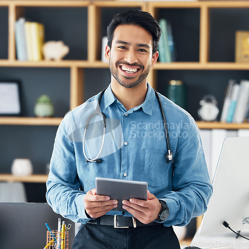 Image of Happy, tablet and portrait of GP smile in medical office holding device for internet, online and web connection. Digital, contact us and man healthcare professional browsing the web or an app