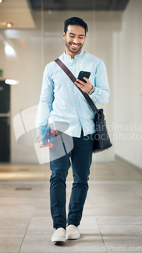 Image of Professional man with smartphone, communication with typing or scroll social media, smile and skateboard. Male, creative at startup and sustainable travel, contact and happy skater leaving office