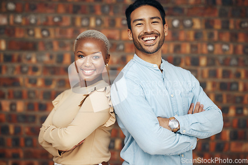 Image of Young, professional team and partnership, portrait with teamwork and friends against wall background. Happy working together, creative pair and diversity, black woman and man, collaboration and trust