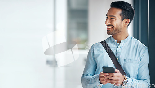 Image of Happy, business and an Asian man with a phone for social media, communication and chat. Thinking, mockup and a Chinese employee typing on a mobile app, replying to a message or work email online