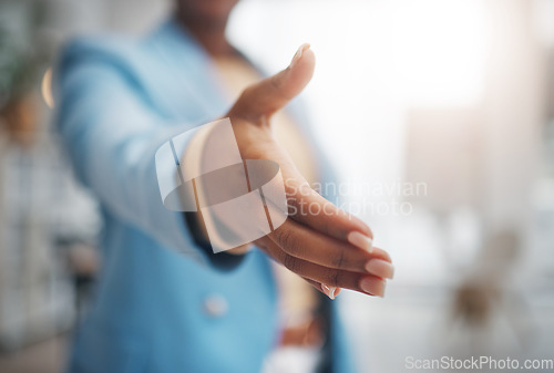 Image of Business woman, handshake and partnership for support, trust or deal in collaboration or meeting at office. Female employee shaking hands for introduction, interview or greeting in teamwork at work