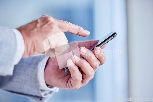 Image of Hands, phone and scrolling with a business man in his office, closeup for communication or networking. Mobile, contact and internet with a male employee typing a text message or making a call