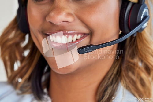 Image of Smile, call center or mouth of happy woman in lead generation for communications company. Friendly consultant, crm or zoom of Indian girl sales agent working online in technical or customer support