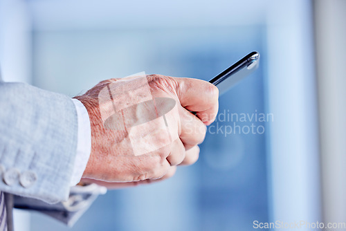 Image of Hands, phone and email with a business man in his office, closeup for communication or networking. Mobile, contact and internet with a male employee typing a text message or making a call