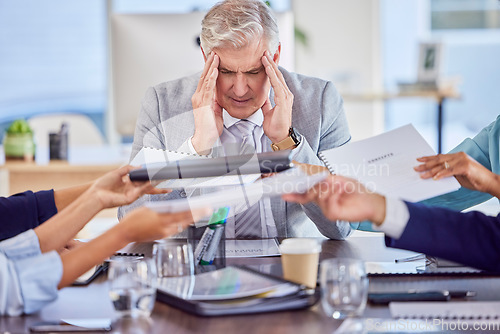 Image of Businessman in meeting with headache pain, burnout or stress with mental health emergency in work office. Senior company manager with anxiety, hands and frustrated with migraine problems or fatigue