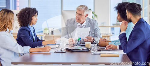 Image of Finance, portfolio and business people in meeting planning a financial strategy for revenue, profit and sales growth. Paperwork, teamwork and startup company employees coworking on report documents