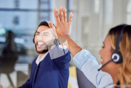 Image of High five, happy people or call center with success in celebration for target deals, winning bonus or goals. Excited consultants, sales agents or friends smile with support, motivation or teamwork