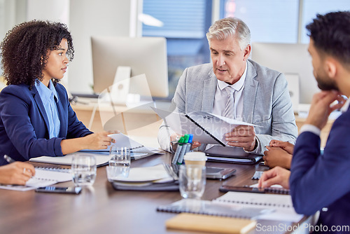 Image of Reading documents, portfolio or business people in meeting planning a financial strategy for revenue or sales growth. Vision teamwork or senior company employees working on finance report paperwork