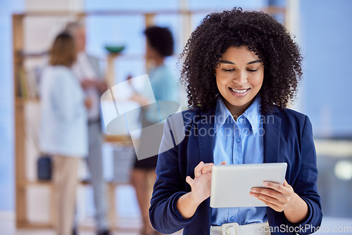 Image of Business woman working on tablet in office workplace for employee engagement, workflow and Human Resources. Corporate biracial person on digital technology for hr application and happy with career