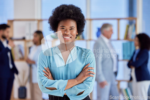 Image of Black woman, business and leadership, smile with arms crossed in portrait with confidence in workplace. Team leader, management and professional female, ambition and happy with career success