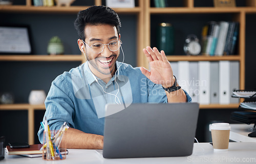 Image of Happy asian man, laptop and smile for video call or communication with earphones at office desk. Male creative designer smiling and waving for webinar, meeting or networking on computer at workplace