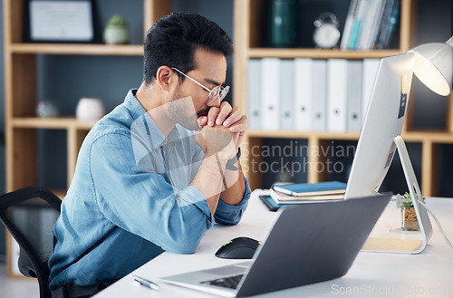 Image of Asian man, stress and laptop in office with glitch, problem and anxiety for proposal, idea or burnout. Businessman, computer and thinking with frustrated, depressed and tired face for company goals