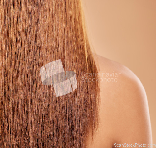 Image of Haircare, back and beauty of woman with straight hair, keratin or healthy hairstyle. Balayage, wellness and female model with salon treatment for growth, texture and brunette extension, wig or dye.