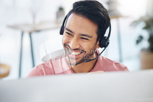 Image of Asian man, call center and smile with headset by computer for consulting, customer service or support at office. Face of happy male consultant with headphones by PC for telemarketing or online advice