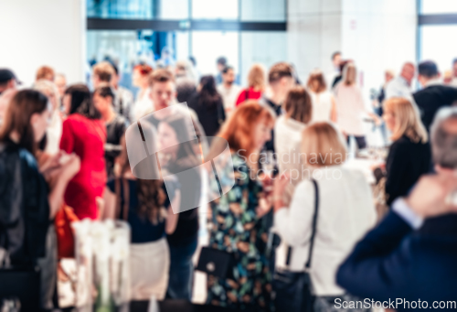 Image of Blured image of businesspeople at coffee break at conference meeting.