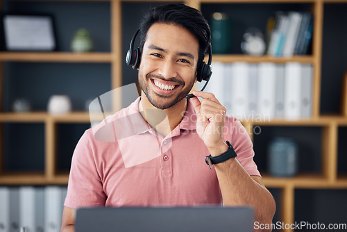 Image of Asian man, call center and portrait smile on laptop for consulting, customer service or support at office. Happy male consultant with headphones by computer for telemarketing, help or online advice