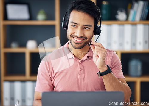 Image of Asian man, call center and headset mic on laptop with smile for consulting, customer service or support at office. Happy male consultant with headphones by computer for telemarketing or online advice