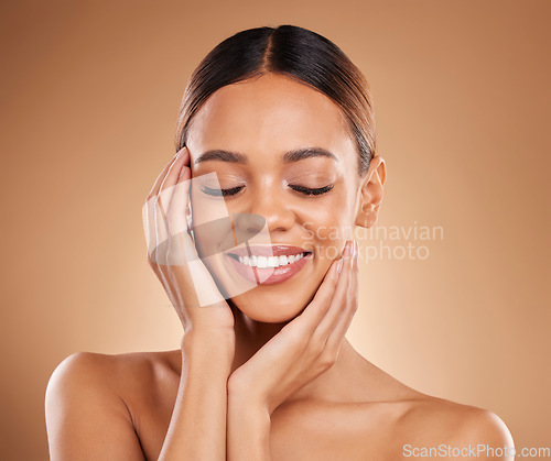 Image of Skincare, natural beauty smile and relax woman with soft skin from facial and dermatology. Self care, isolated and studio background with a young model feeling face after spa and cosmetics treatment