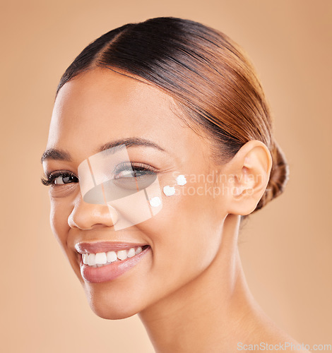 Image of Face portrait, skincare and woman with cream in studio isolated on a brown background. Dermatology, beauty cosmetics and happy female model with lotion, creme or facial moisturizer of skin health.
