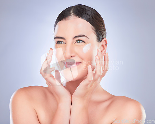 Image of Happy beauty, face and woman with cream product for luxury makeup, facial cosmetics or female acne protection. Studio dermatology, collagen hydration and skincare person isolated on grey background